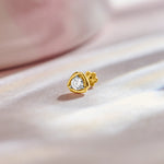 Regal Glow Single Solitaire Diamond And Gold Nose Pin For Women