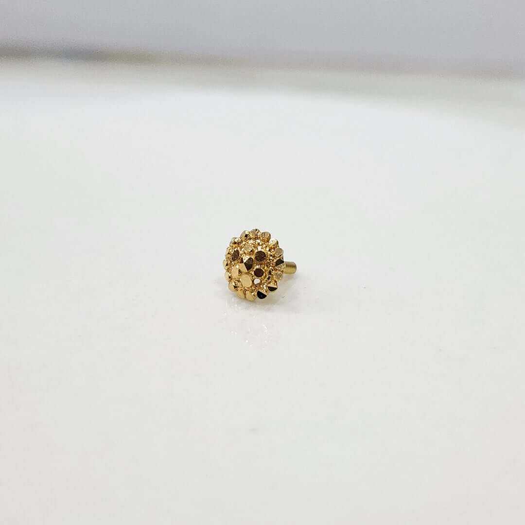 Auric Corona gold nose pin 18K angled view with radiant circular sunrise-inspired design on plain background