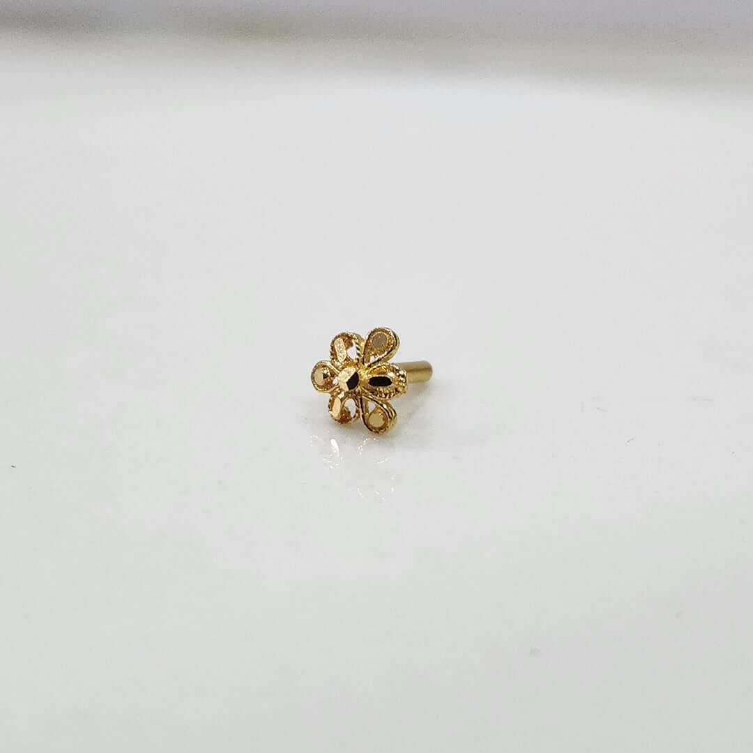 Petal Dome gold nose pin 18K angled view with intricate floral dome design on plain background