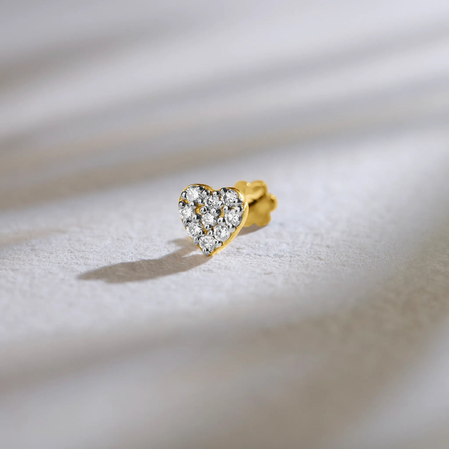 Heartful Diamonds Gold Diamond Nose Pin Design Online