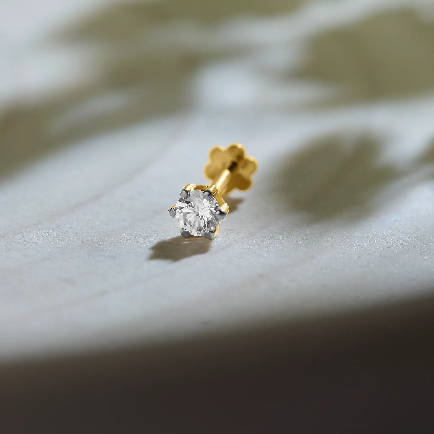 Royal Spark Single Solitaire Diamond Nose Pin Design From Kerala In Gold