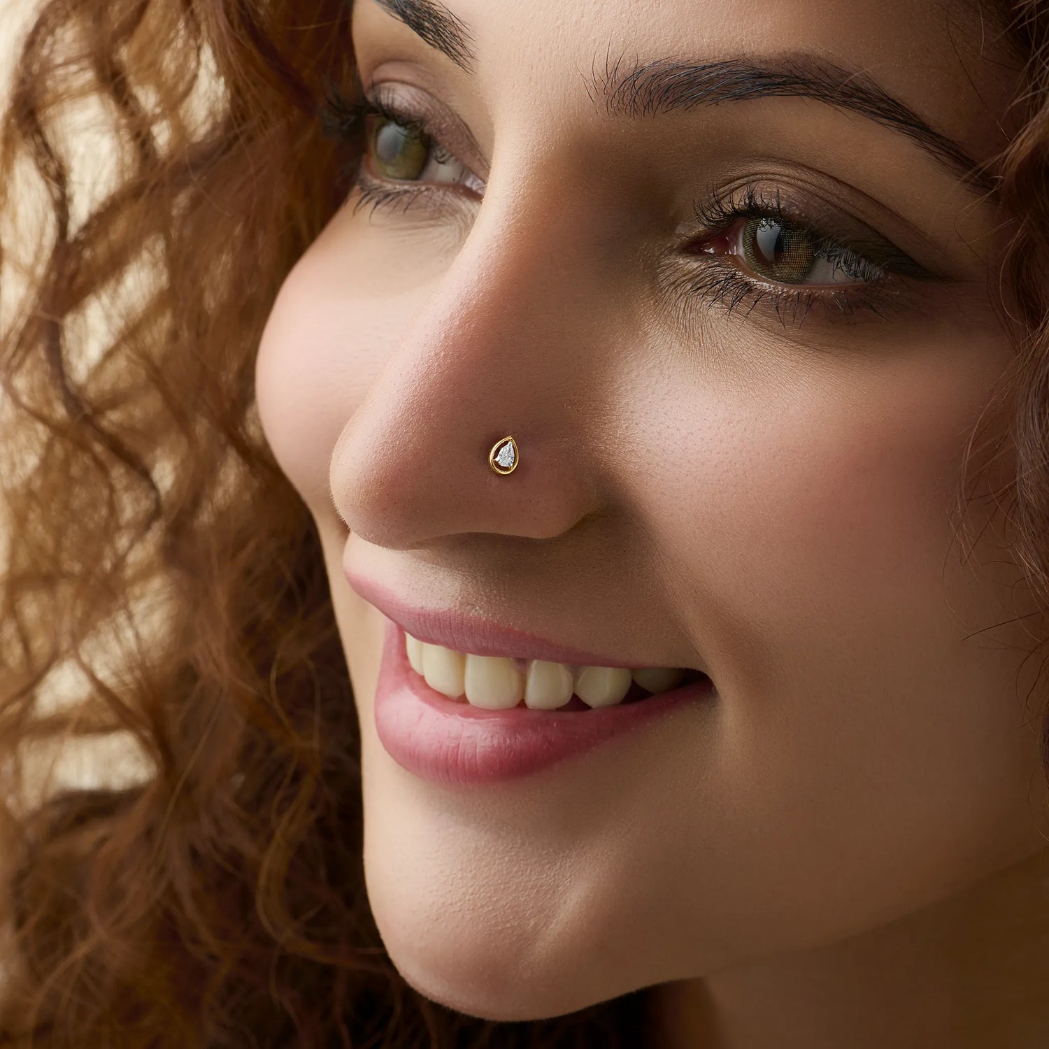 Royal Drop Single Solitaire Nose Pin Gold And Diamond For Women