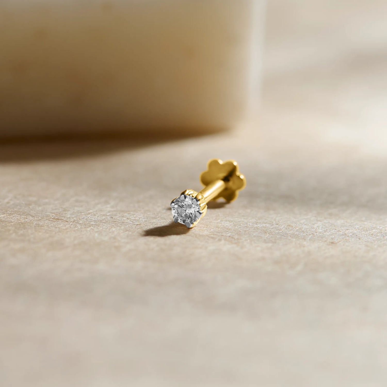 Royal Clad Single Solitaire Diamond Nose Pin Design From Kerala In Gold