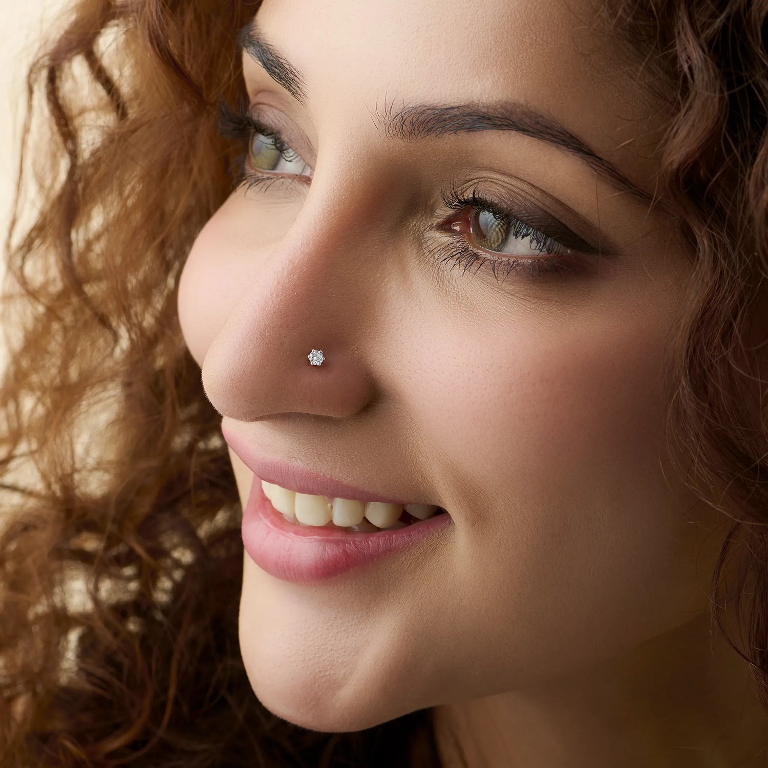 Royal Clad Single Solitaire Diamond Nose Pin Design From Kerala In Gold