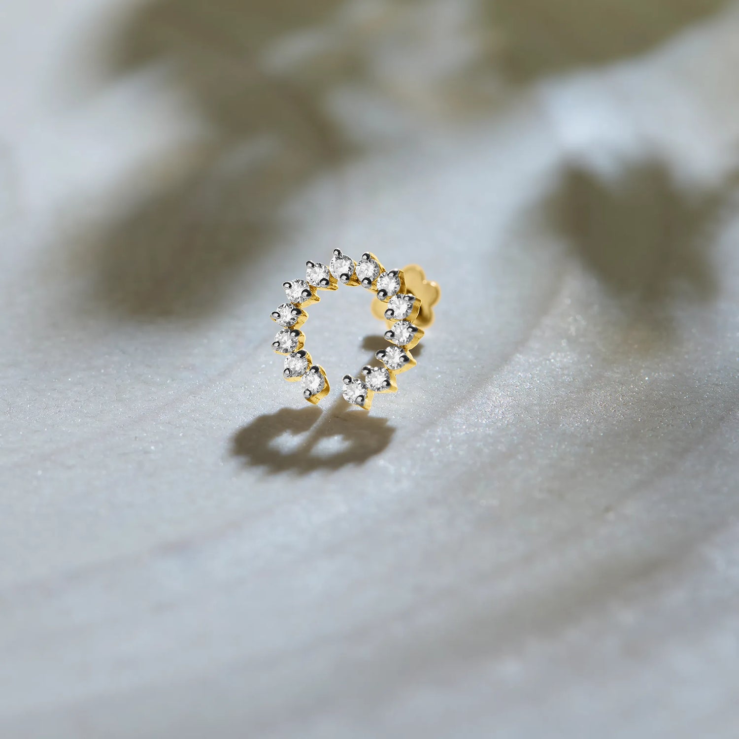 Metro Spark Arc Shaped Diamond And Gold Nose Pin For Women