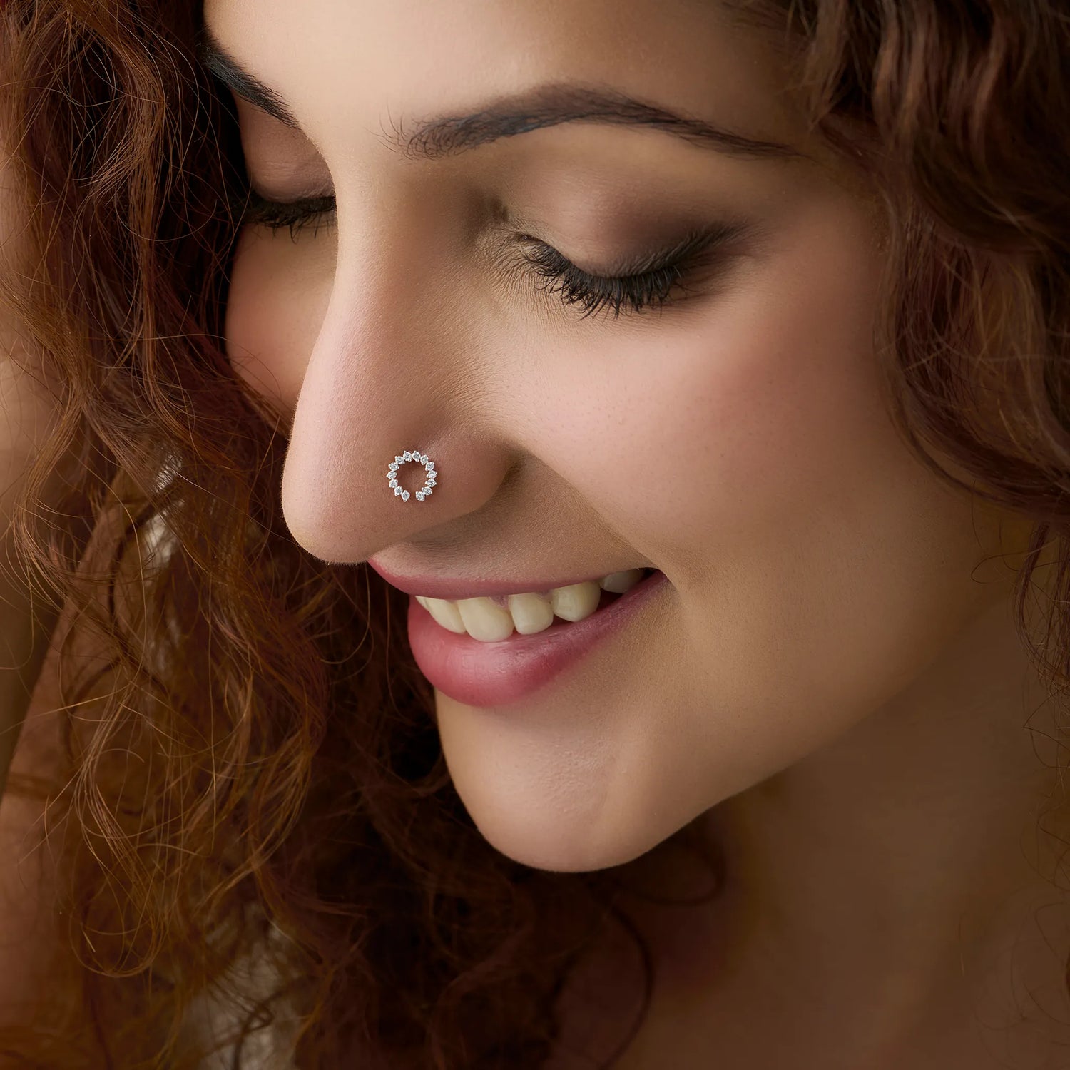 Metro Spark Arc Shaped Diamond And Gold Nose Pin For Women