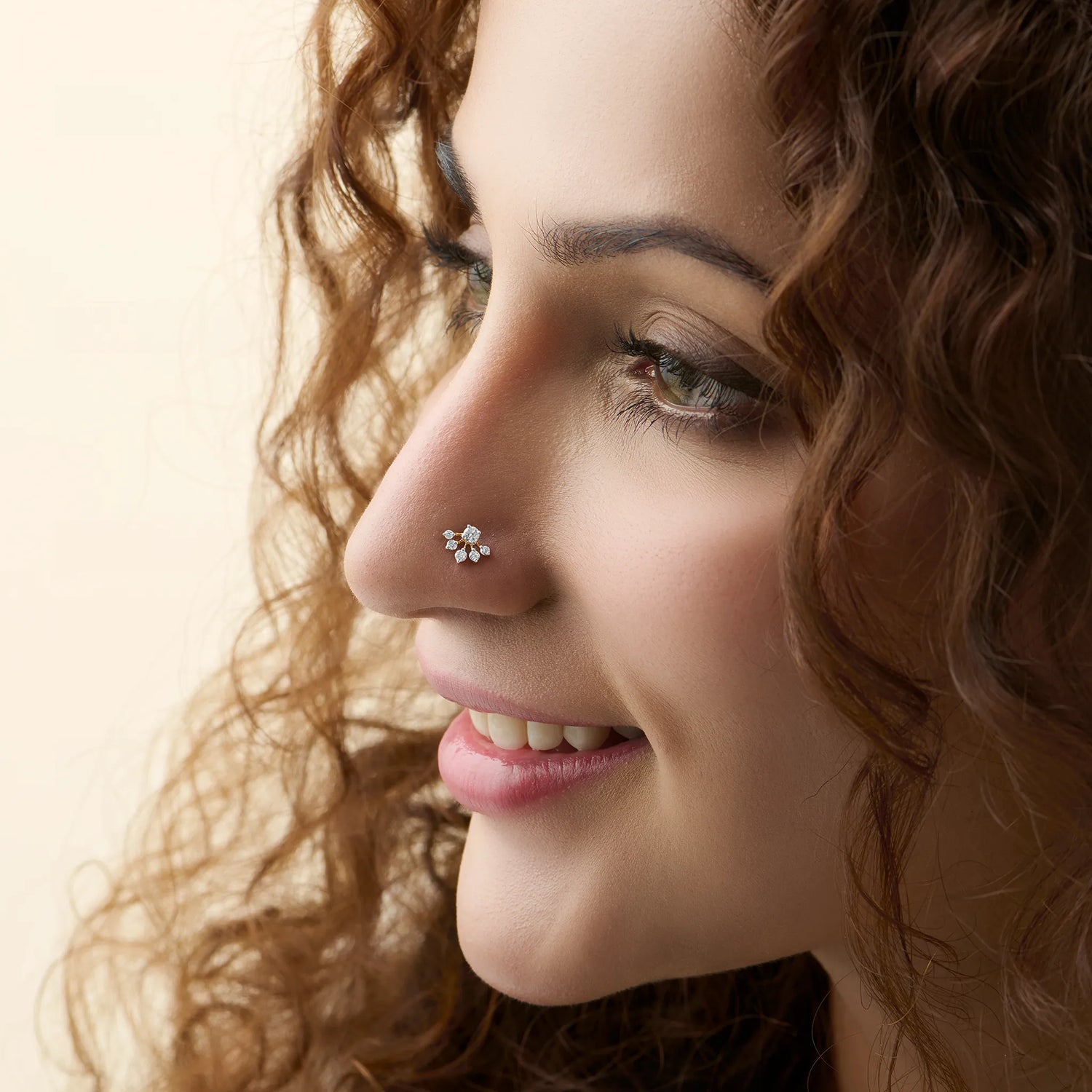 Crystal Spring Inverted Flower Inspired Diamond And Gold Nose Pin