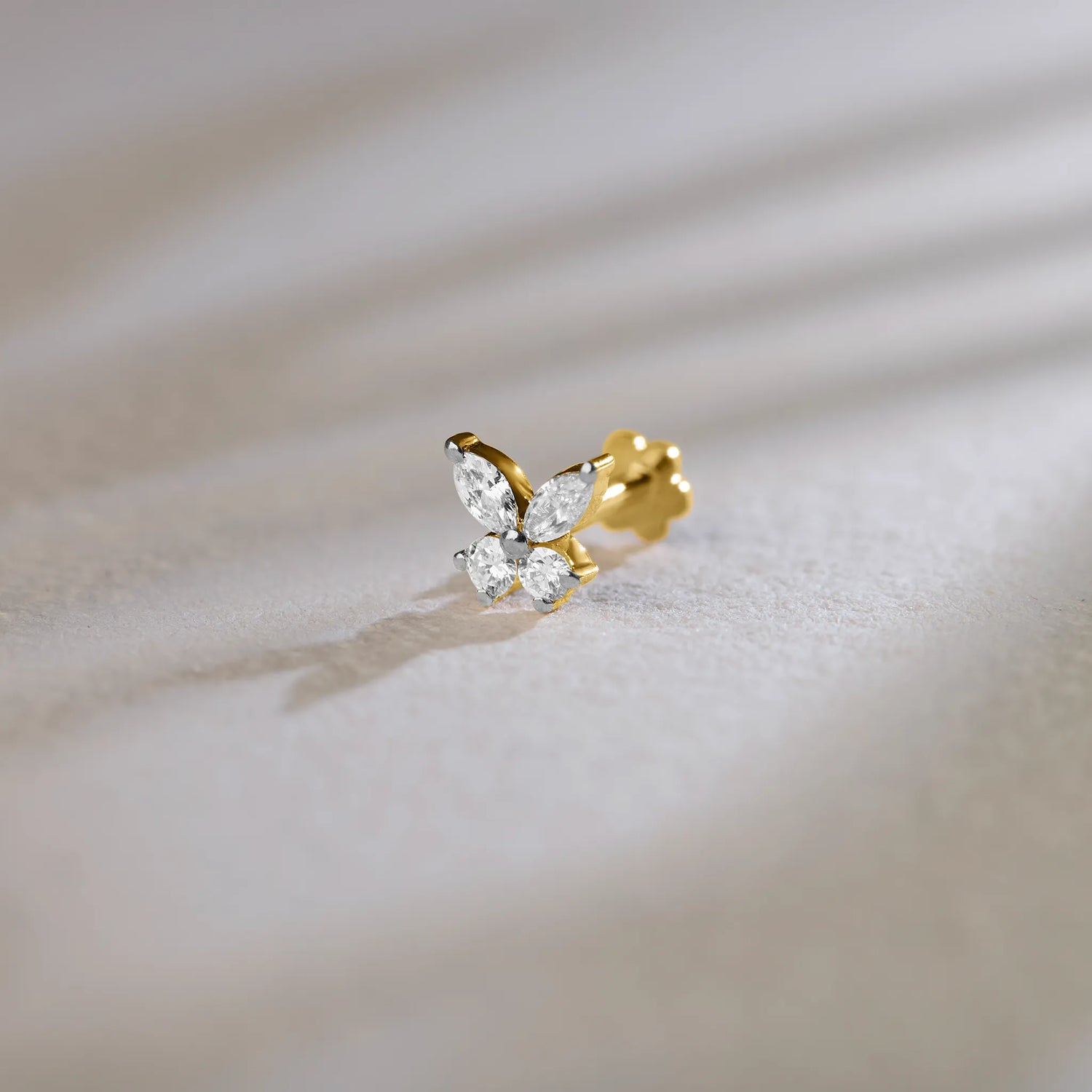 Premium lab grown diamond nose pin in real gold with modern curved design, lightweight everyday diamond nose ring for women, BIS hallmarked 14K gold nose jewellery with certified lab diamonds by Yuvora, elegant minimal nose pin for daily wear, gifting, bridal and contemporary Indian styling.