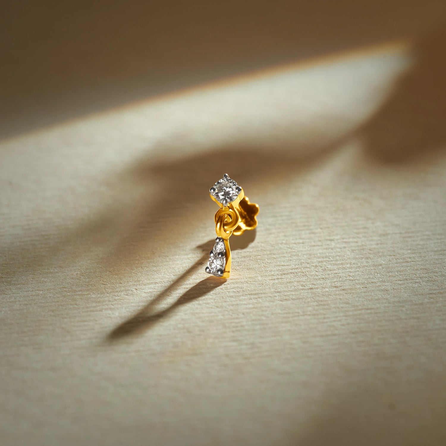 Knot Loop Inspired Diamond And Gold Nose Pin