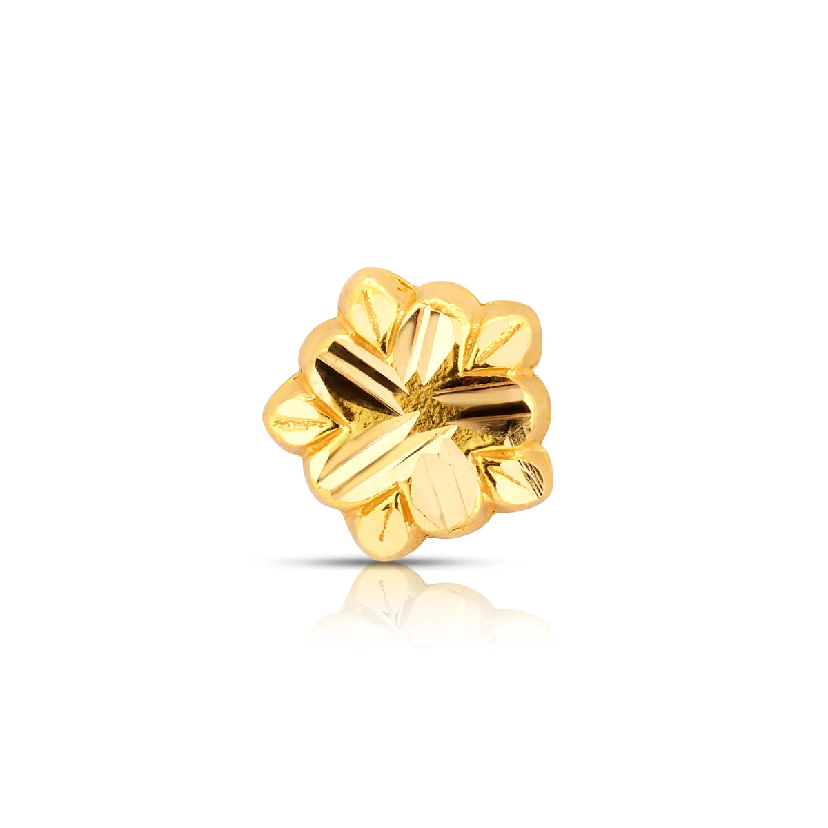 Small floral gold nose pin design displayed in close-up on white background