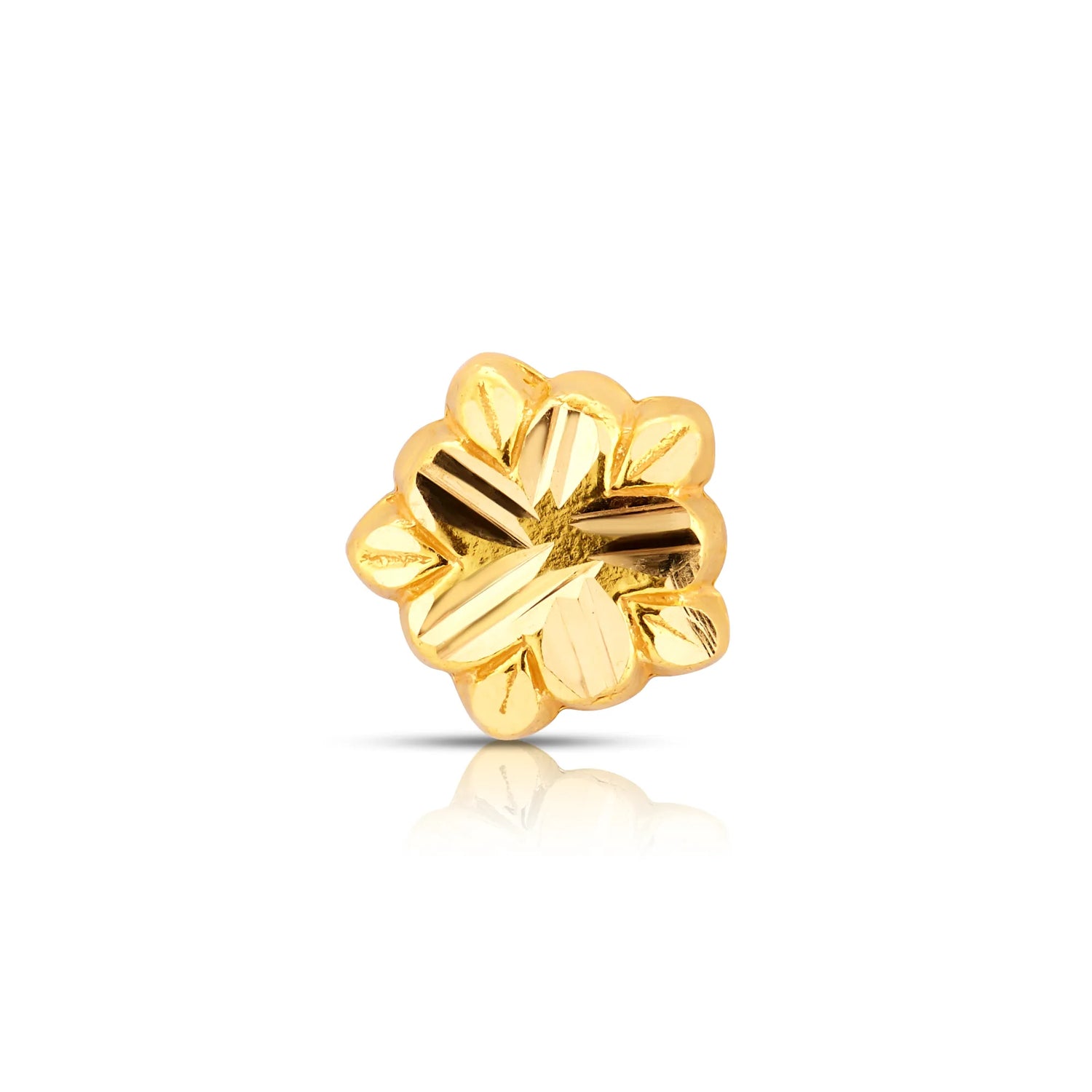 Small floral gold nose pin design displayed in close-up on white background
