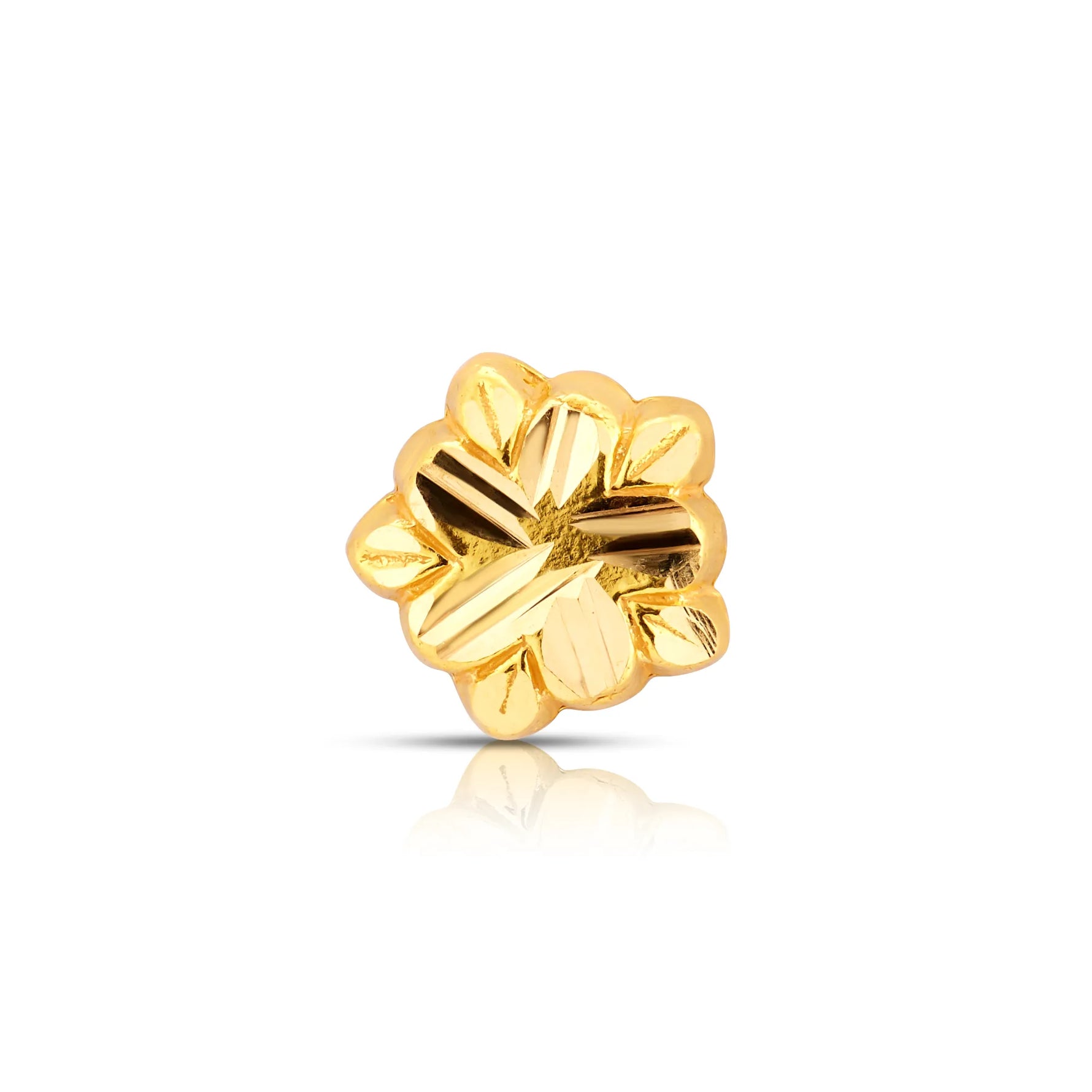 Small floral gold nose pin design displayed in close-up on white background