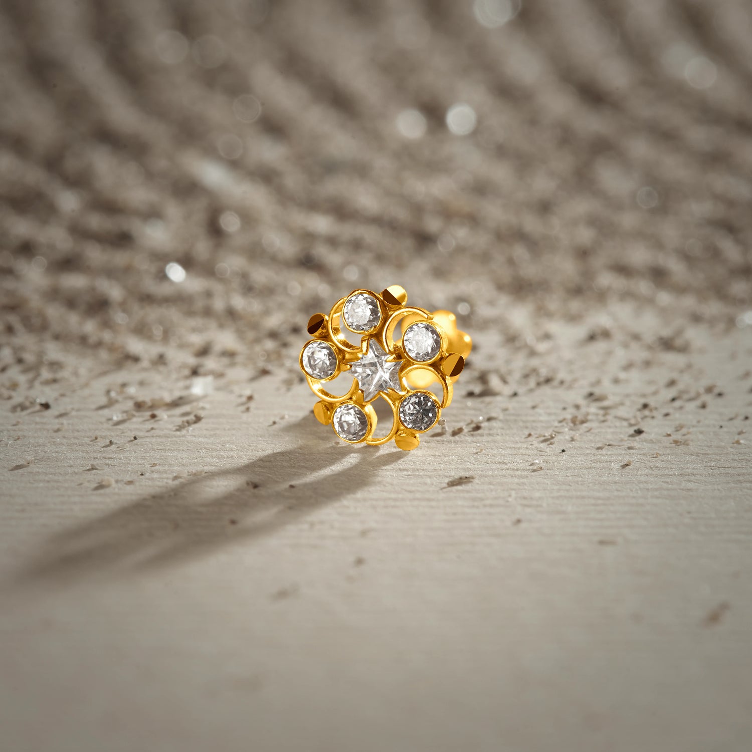 Twinkle Flower 18K Swirl Patterned Flower Stone Gold Nose Pin Design For Women