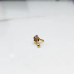 Stone gold nose pin side angle showing post and setting