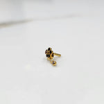 Stone gold nose pin minimal floral style close up