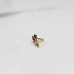 Stone gold nose pin minimal floral style close up