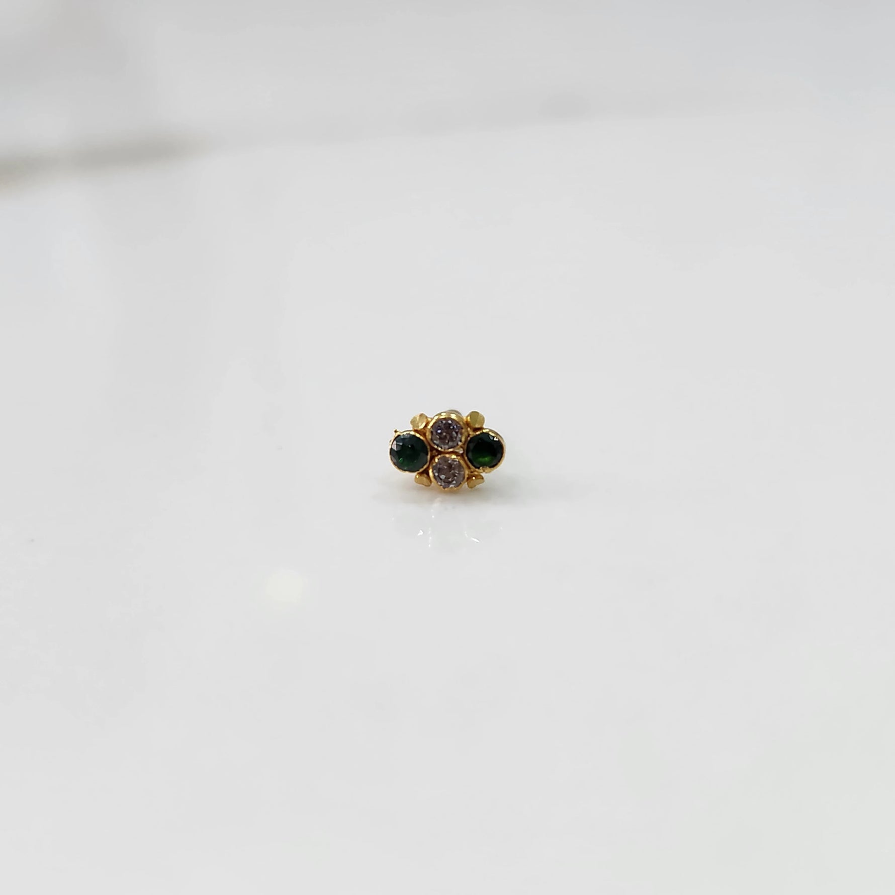 Women's gold nose pin design with gstone cluster minimal style