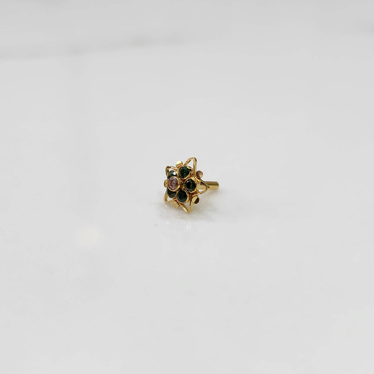 Nose pin design gold with tiny multicolor gemstone flower design