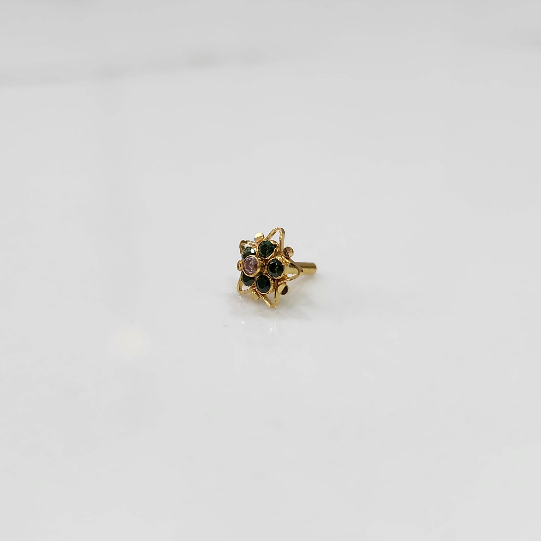 Nose pin design gold with tiny multicolor gemstone flower design
