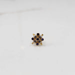 Stone gold nose pin close up with sparkling stones