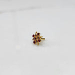Tiny stone gold nose pin minimal style front view