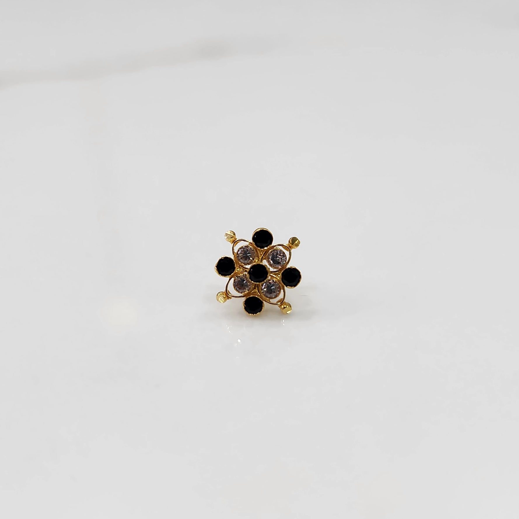 Stone gold nose pin small size detailed top view