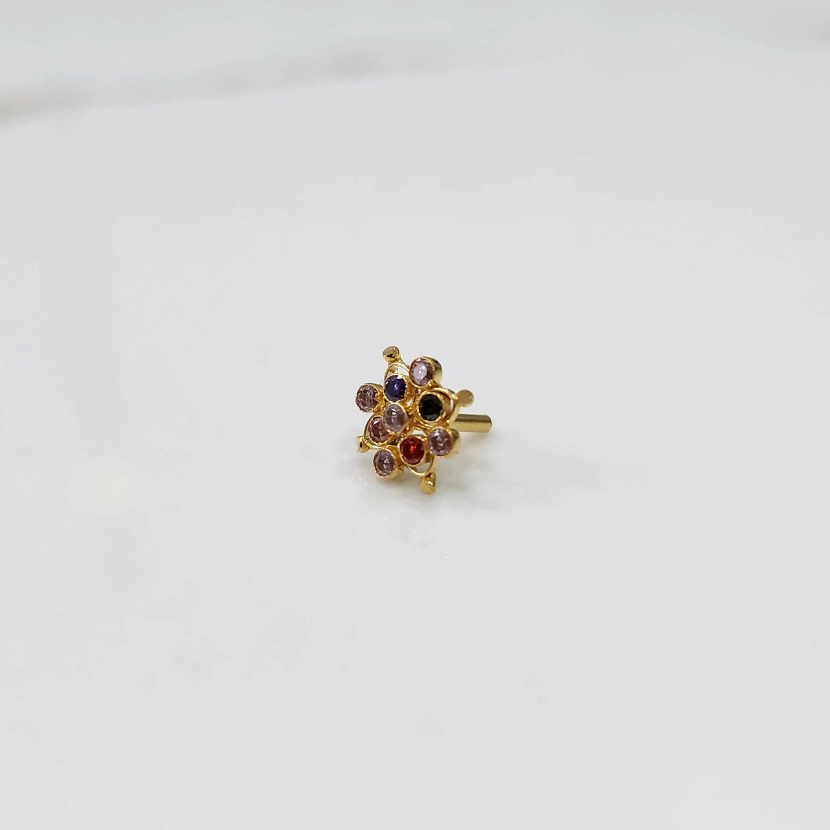 Stone gold nose pin small size detailed top view