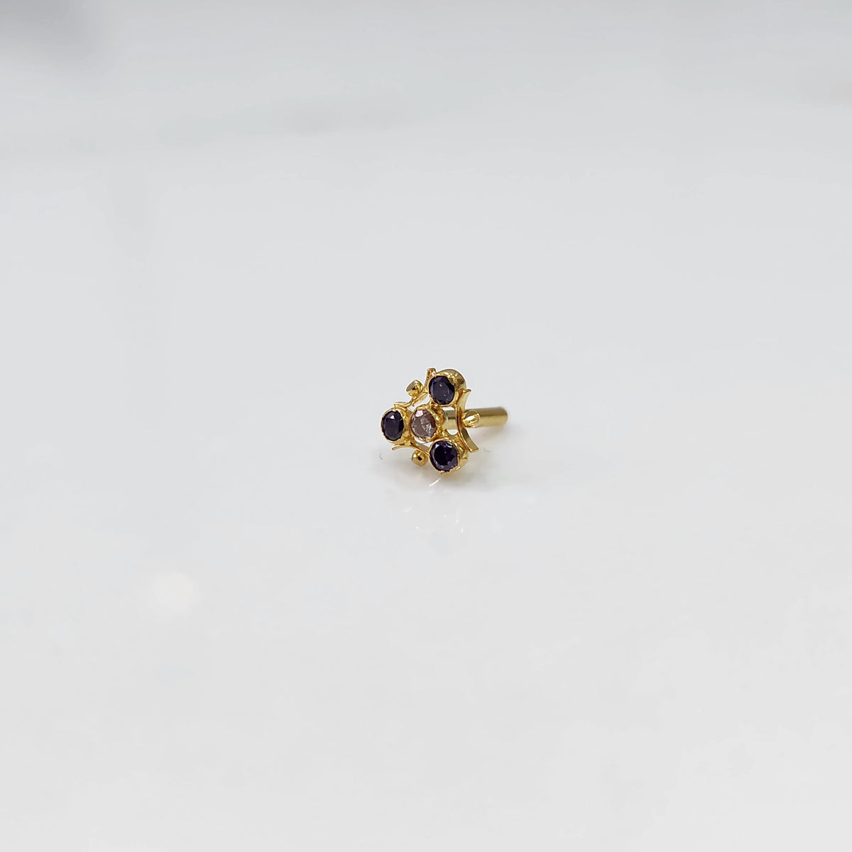 Tiny nose pin gold with small floral gemstone design minimal style