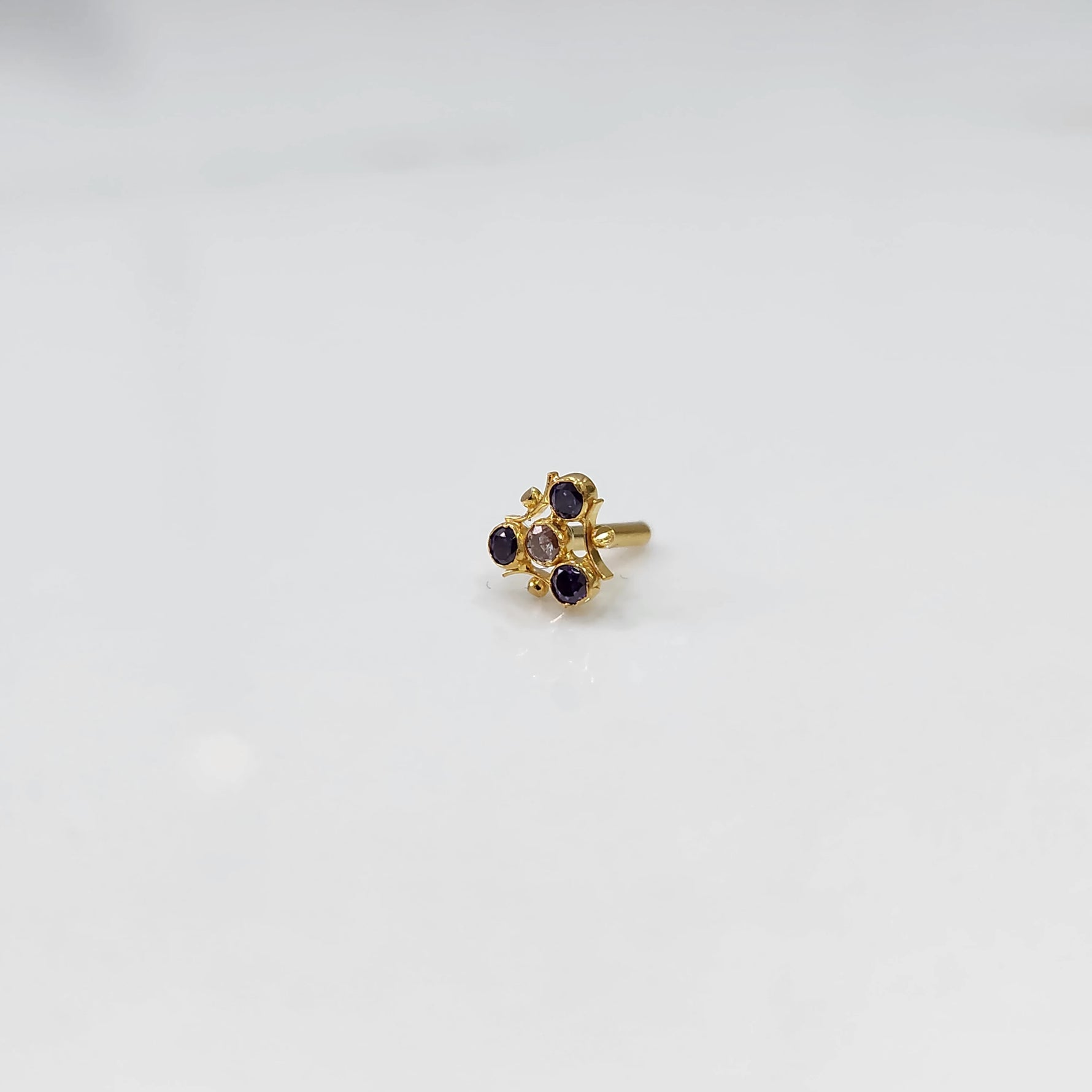 Tiny nose pin gold with small floral gemstone design minimal style