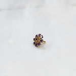 Gold nose pin design with multicolor floral arrangement