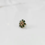 Minimal gold nose pin design with small floral stones