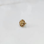 Side view gold nose pin design with white gemstone floral setting
