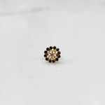 Gold nose pin design with detailed floral diamond arrangement