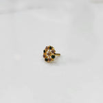 Gold pin nose with compact floral diamond design on white background
