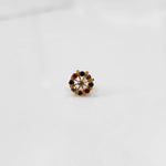 Gold pin nose with small floral diamond design
