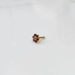 Nose pin design gold with multicolor floral stones side angle on white background