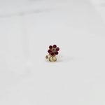 Lab grown diamond nose pin with red stone floral design on white background
