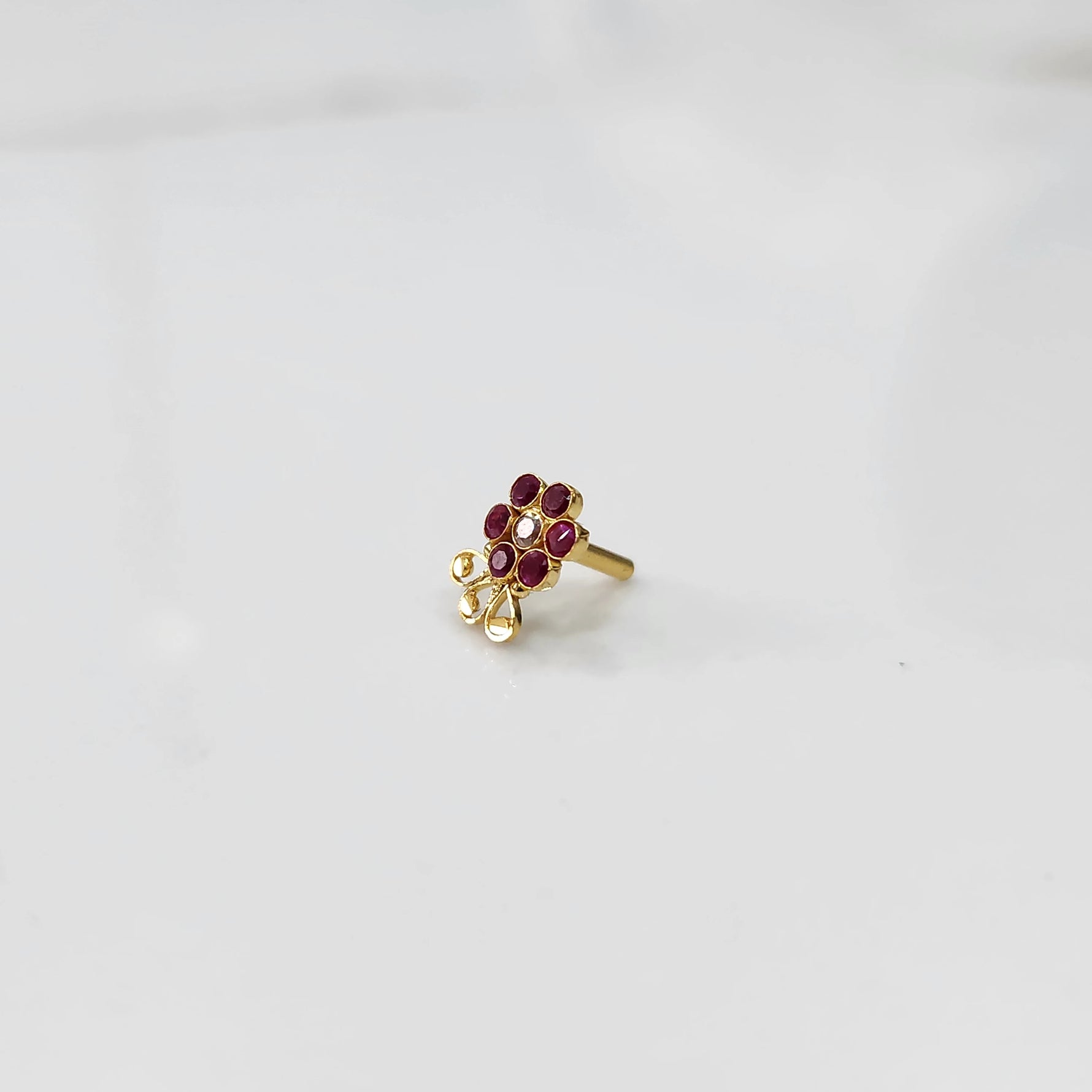 Side angle lab grown diamond nose pin with floral gemstone cluster