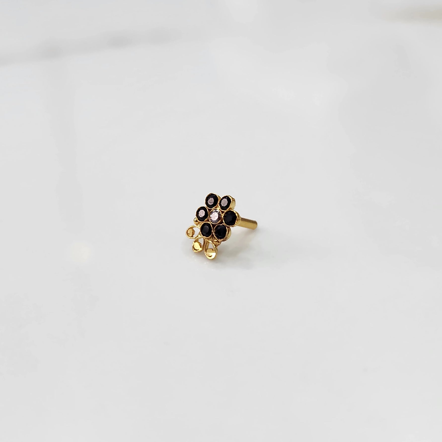 Lab grown diamond nose pin with dark stone floral design