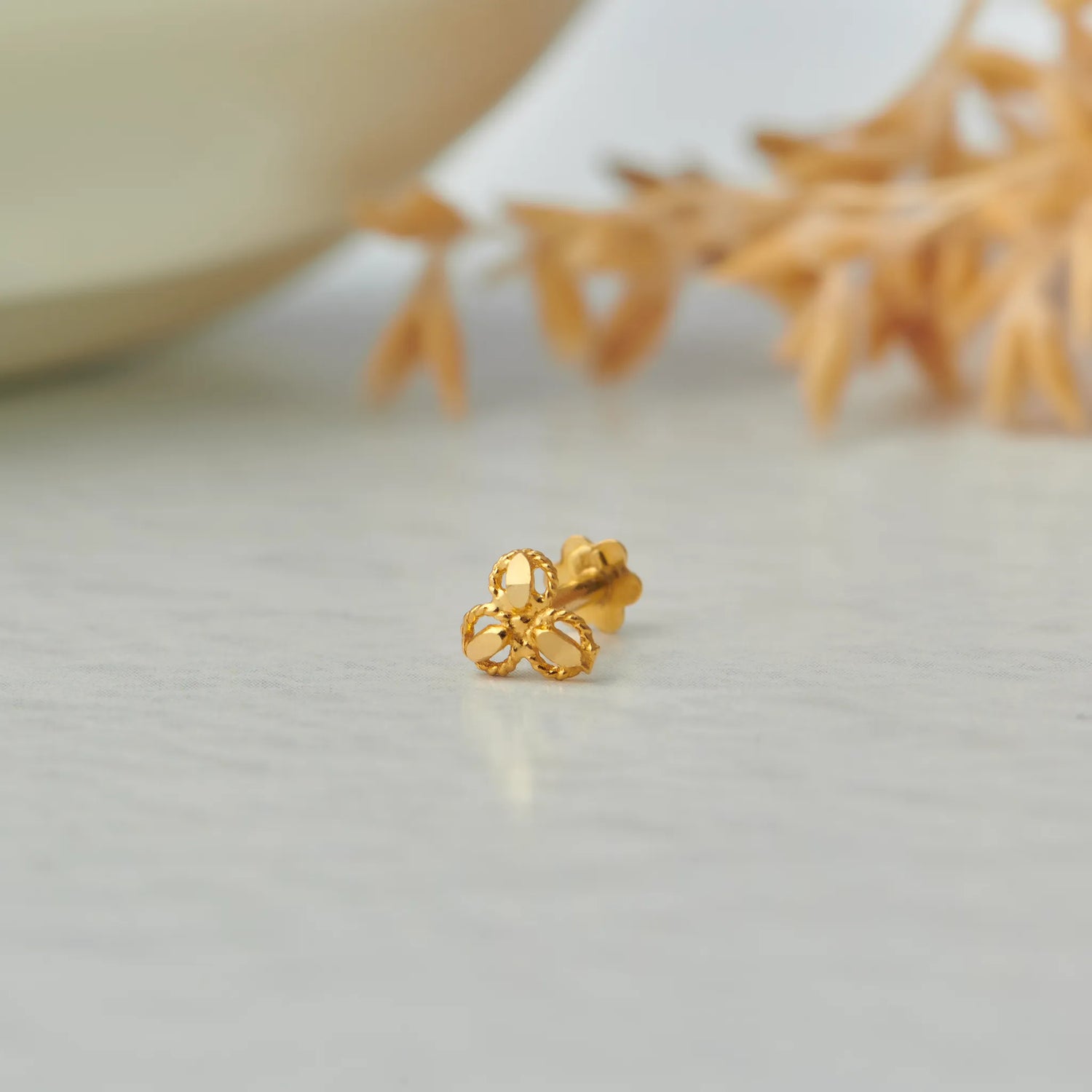 Tri Petal Crest Gold Nose Pin – Simple 18K Nose Pin Gold Design for Women