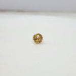 Auric Corona gold nose pin 18K close-up view with radiant circular sunrise-inspired design on plain background