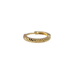 Enigma Weave gold nose pin side view showcasing intricate engraved weave design in 18K gold