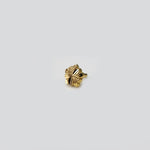 Angled side view of five-petal 18k gold nose pin with detailed floral carving, crafted in lightweight gold for elegant daily wear.