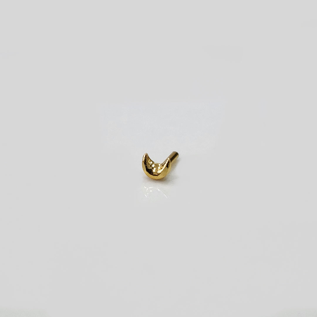 Golden Crescent gold nose pin 18K shown in angled view with crescent moon design
