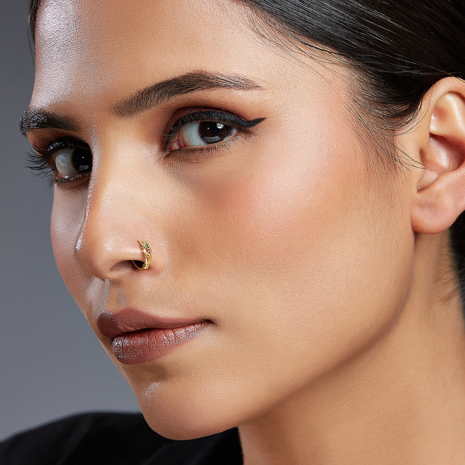 Model wearing Yuvora Heart Duet Gold Nose Ring in 18K gold with dual heart design, elegant jewellery for modern women
