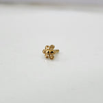 Petal Dome gold nose pin 18K angled view with intricate floral dome design on plain background