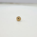 Petal Dome gold nose pin 18K close-up view with floral dome design on plain background