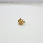 Radiant Filigree gold nose pin 18K angled view with intricate floral filigree design on plain background