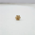 Radiant Filigree gold nose pin 18K close-up view with detailed floral filigree design on plain background