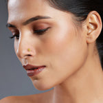 Radiant Filigree gold nose pin in 18K worn by model, intricate floral filigree design jewelry for women